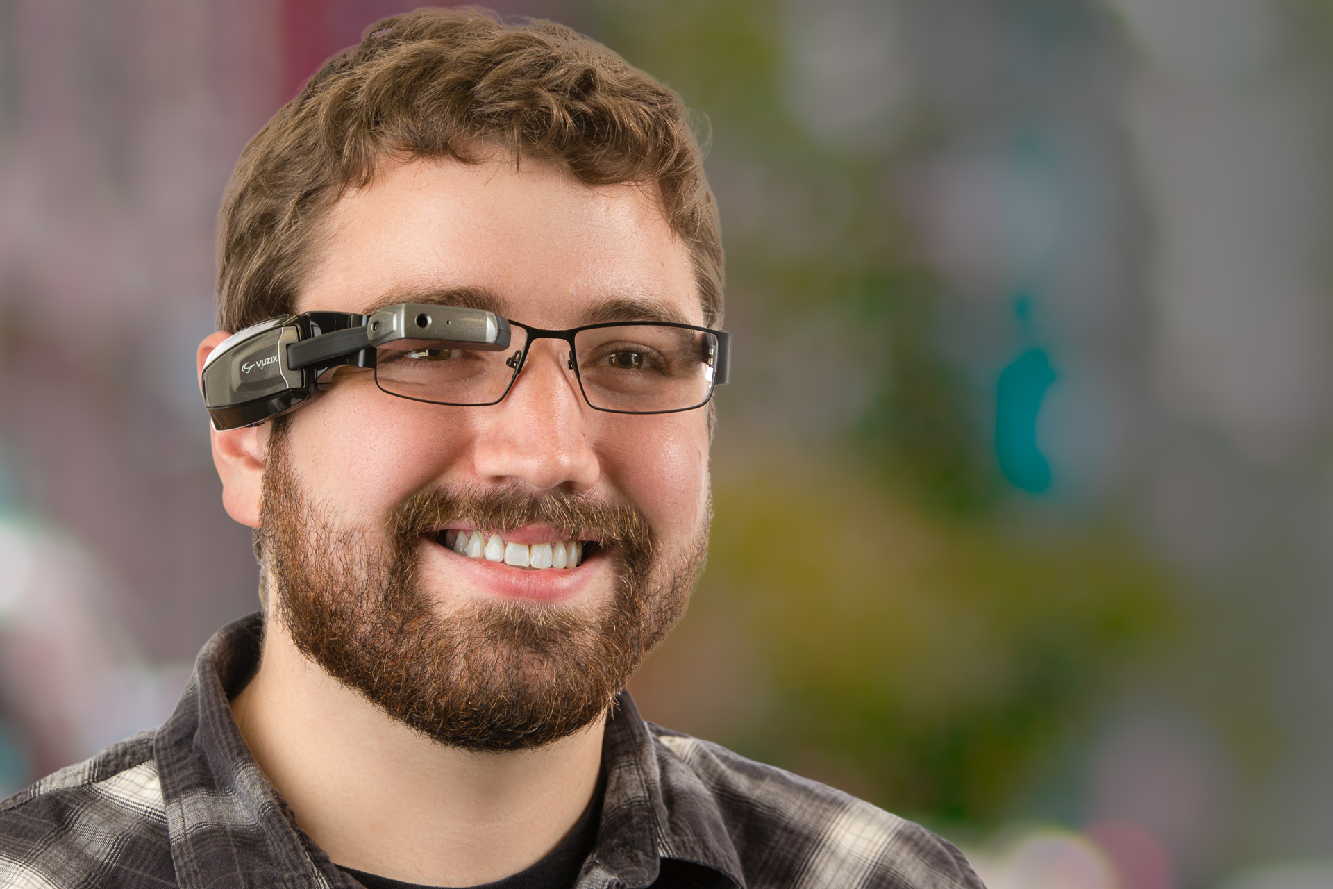 A man with the Vuzix M100